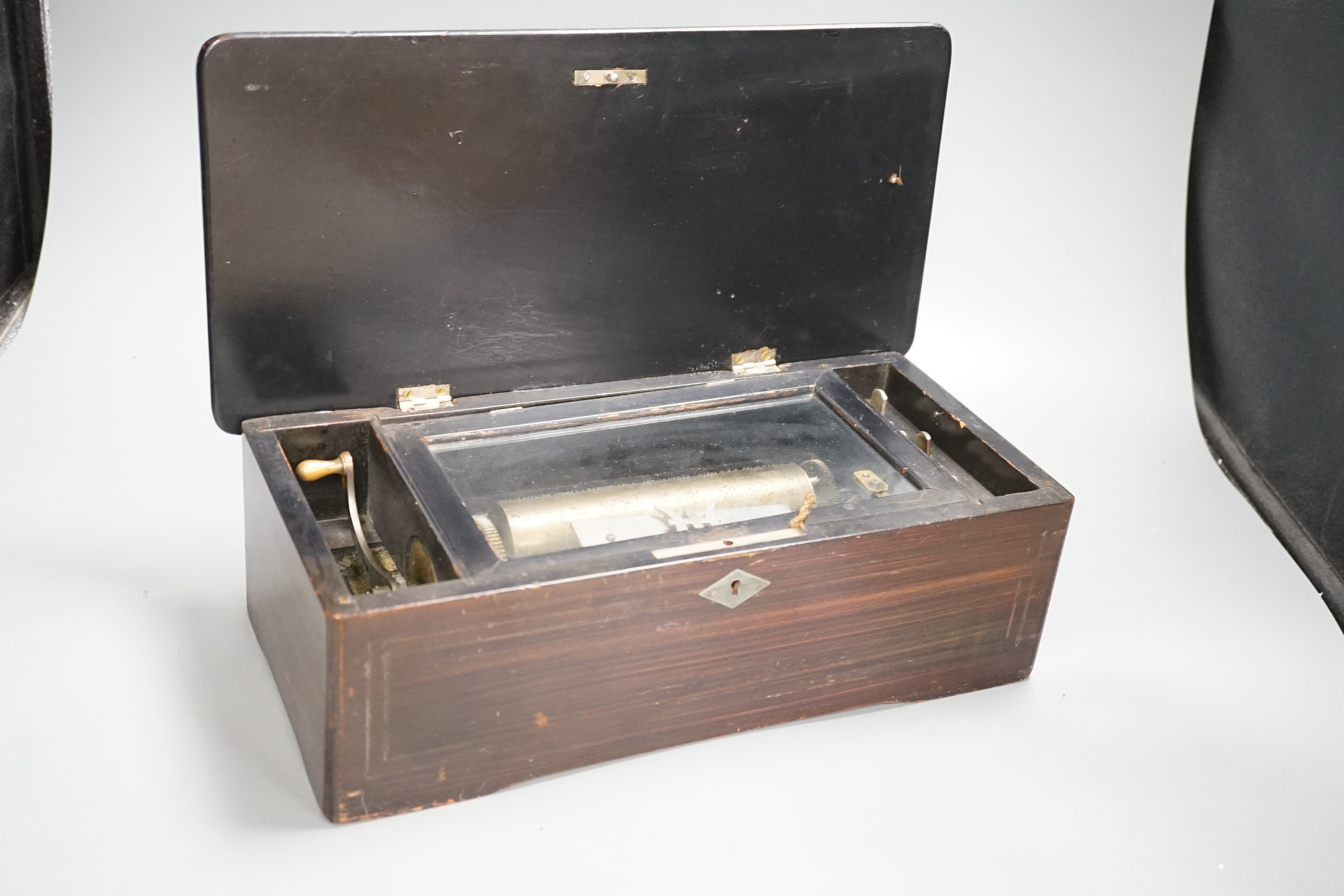 A late 19th century Swiss musical box. Case 37cm long, cylinder 15.5cm long